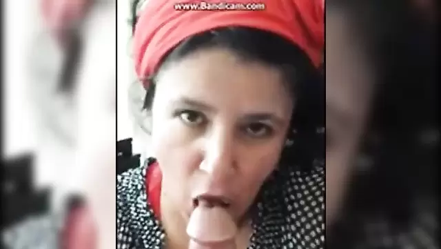 A Turkish mature woman enjoys a penis in her mouth